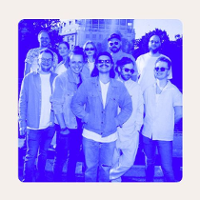 Photo of the band in blue colours.