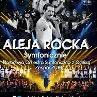 Concert poster with information about the event and photo of performers on stage.