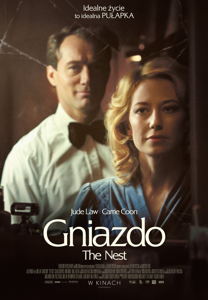 Film poster: picture of a man in white shirt and a bow-tie and a woman in blue dress; a man stands behind a woman.