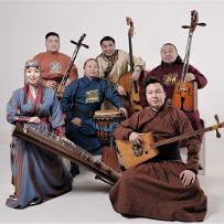 Five men and one woman in traditional Mongolian folk costumes pose with instruments.