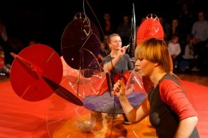Photo from the spectacle - two women performing on stage