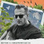 Picture of an artist - face of a man in black sun glasses.