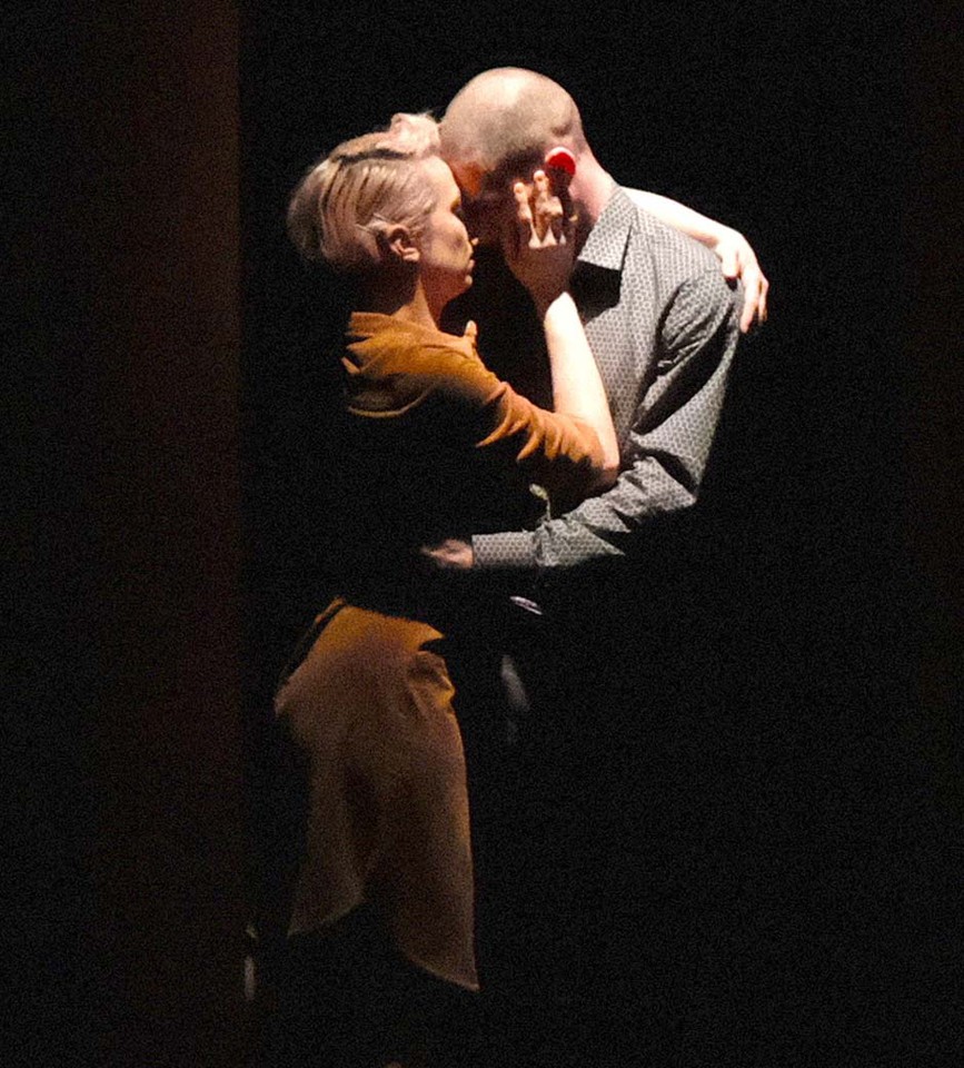 Photo from the performance: a couple in a hug