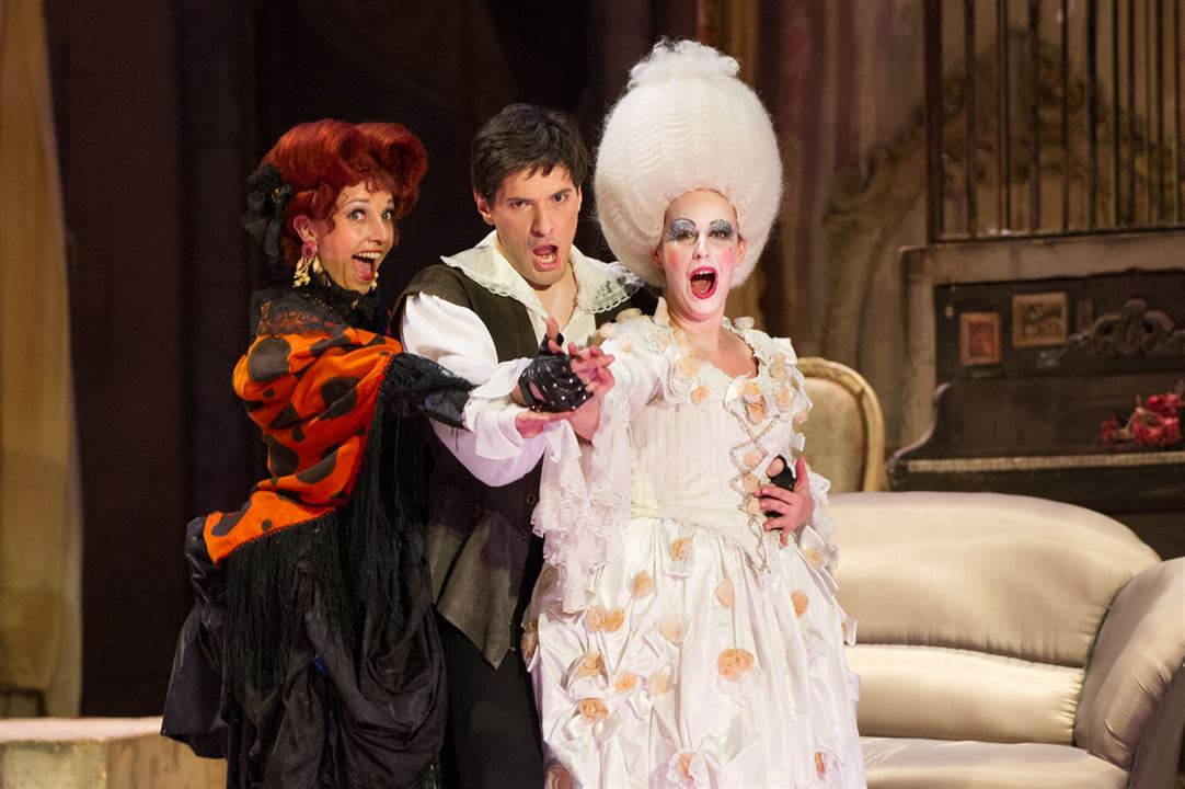 Photo of three opera singers in stage outfits