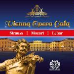 Poster of Vienna Opera Gala: gold lettering on blue background, white lettering on red stripe, golden sculpture of a man in the foreground, golden buldings in the background