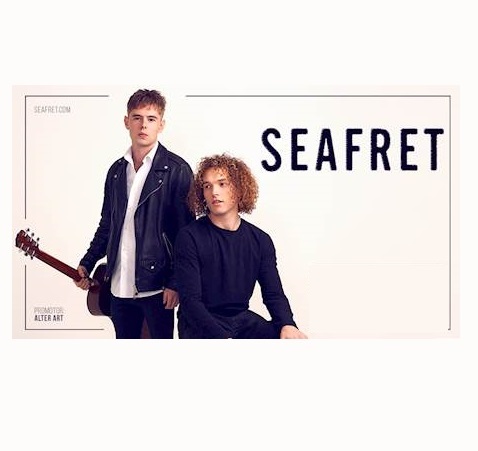 Na banerze zdjęcia członków zespołu.