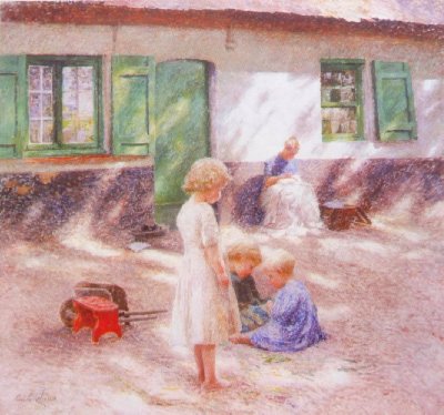 Dzieci bawią się przed domem