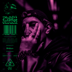 Na czarno-zielonym tle fioletowa twarz mężczyzny.