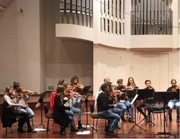 Na obrazku widać grupę muzyków. Wszyscy grają na skrzypcach.