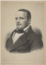 Obrazek przedstawia Stanisława Moniuszkę czyli niskiego mężczyznę z krótkimi włosami.