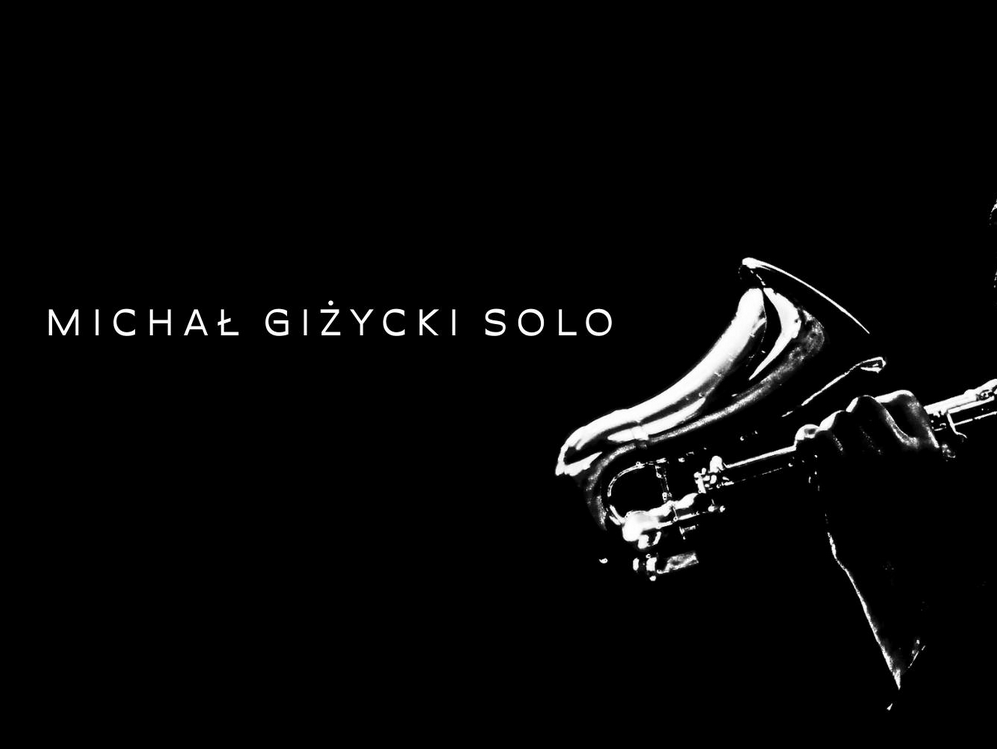 Na czarnym tle fragmnet saksofonu, oraz napis Michał Giżycki solo.