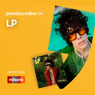 Plakat ze zdjęciem artystki i okładką płyty w prawej części. W części lewej pseudonim na pomarańczowym tle.