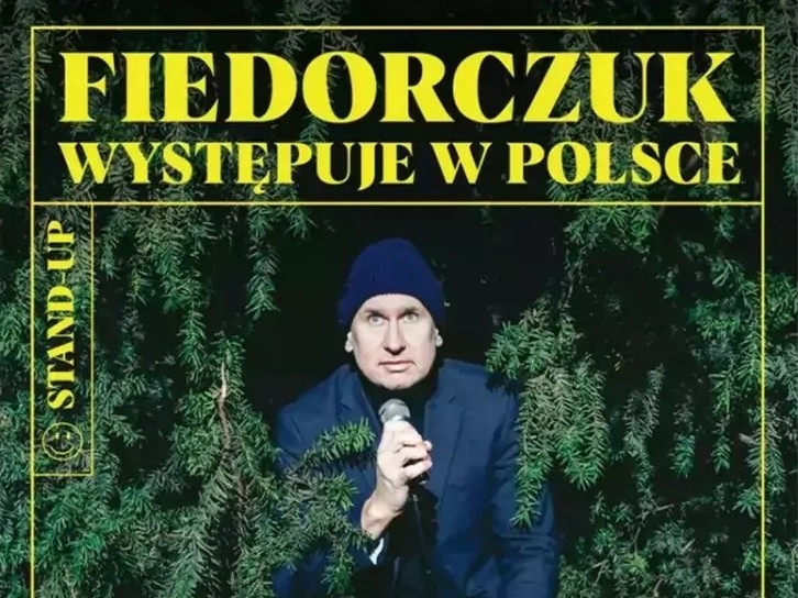 Plakat występu Wojtka Fiedorczuka, ze zdjęciem artysty.