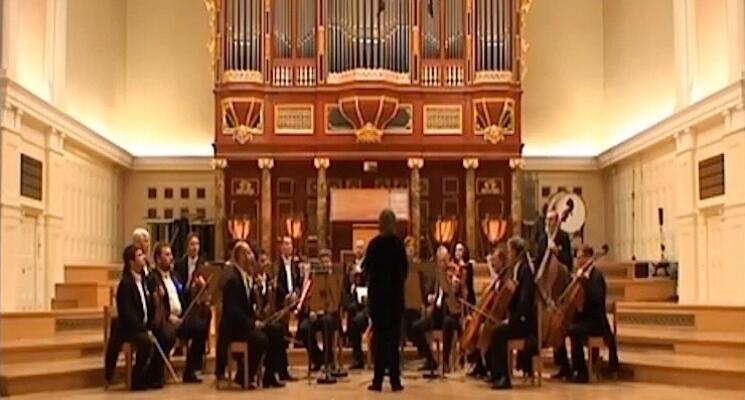 Na zdjęciu artyści na scenie auli UAM.